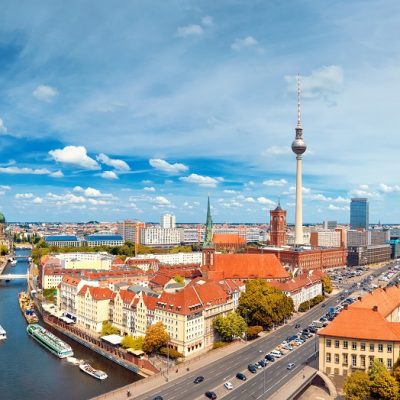 Aerial view of central Berlin on a bright day, including river S Aerial view of central Berlin on a bright day in Summer, including river Spree and television tower at Alexanderplatz